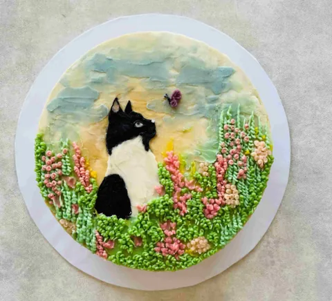 Cat in a field, a Fig & Owl cake