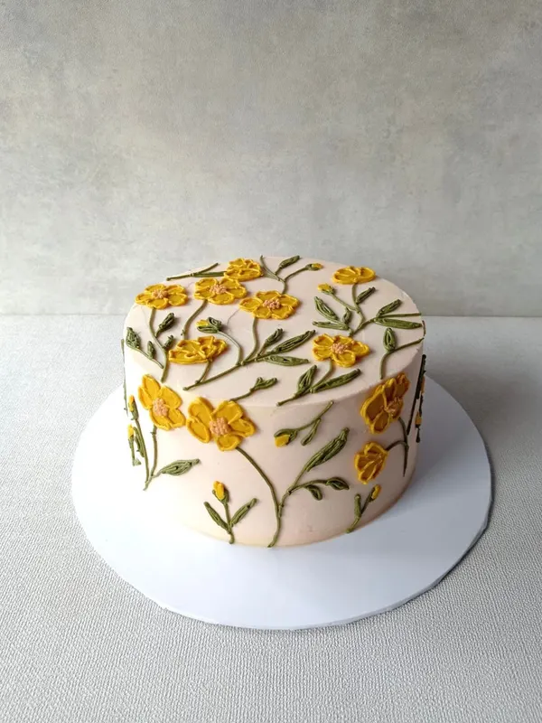 A Fig & Owl buttercream cake