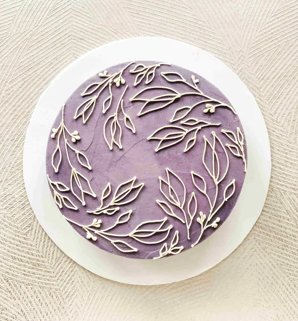 A Fig & Owl buttercream cake