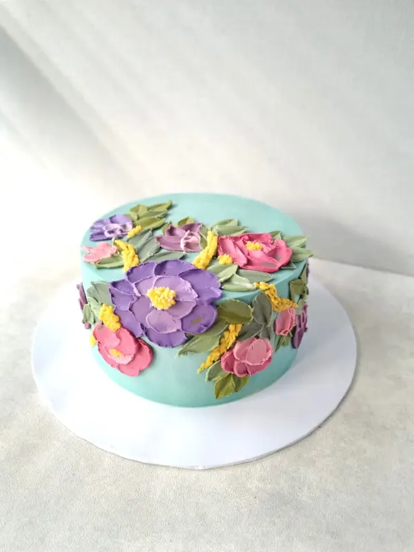 A Fig & Owl buttercream cake