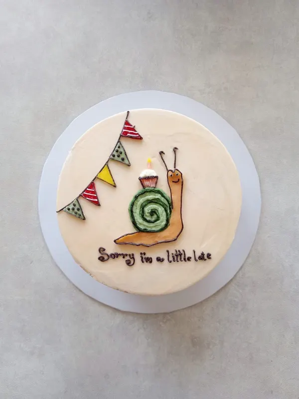 A Fig & Owl buttercream cake
