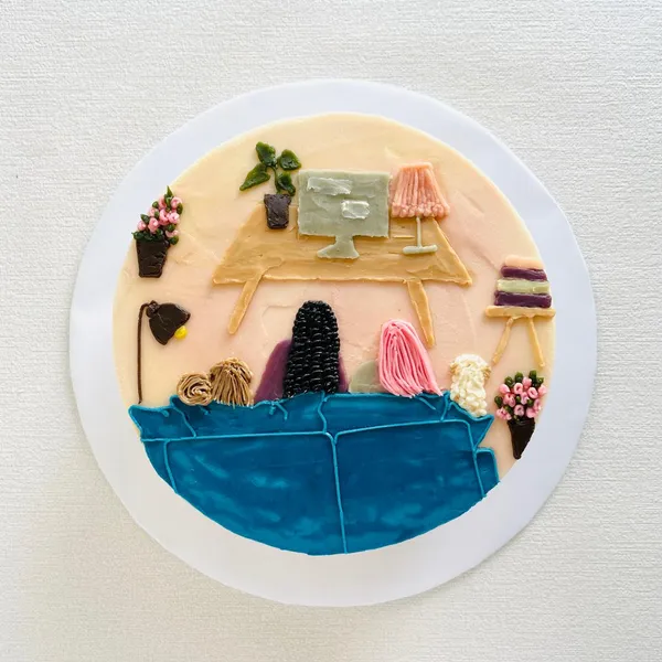 A painted everyday moment, hand-piped in buttercream